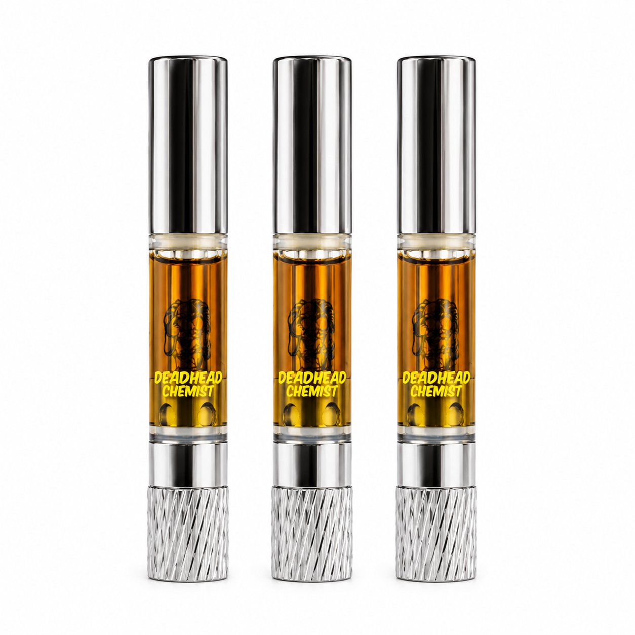 Three one milliliter clear glass oil cells arranged side by side on a clean white background